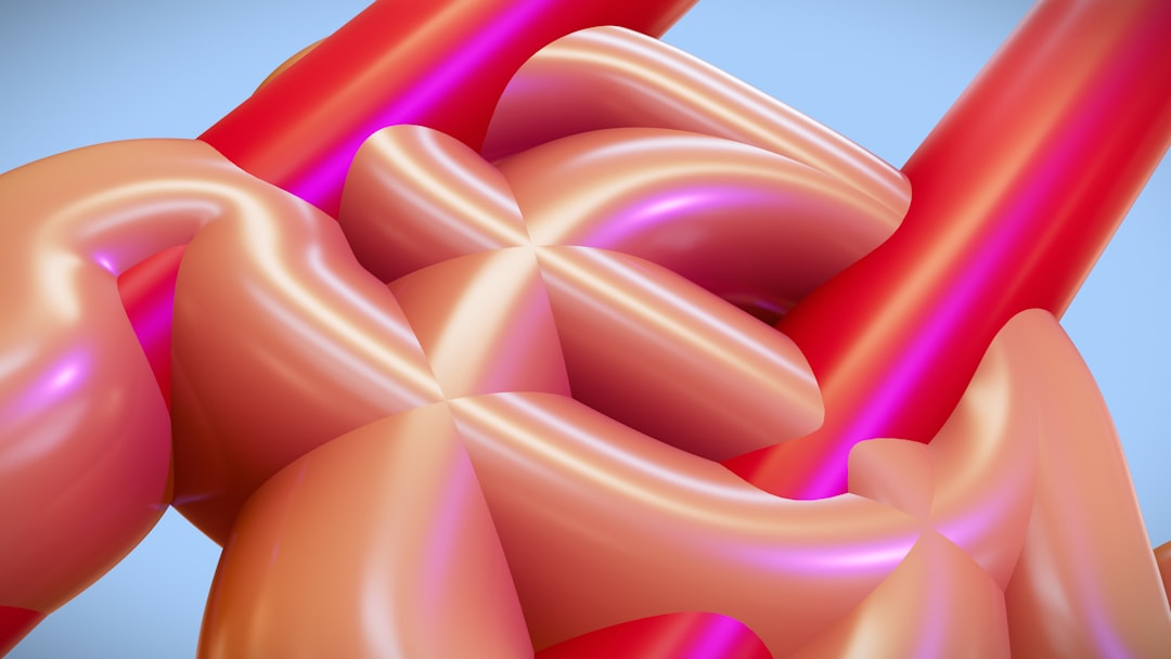 a computer generated image of a red and pink object